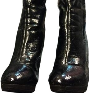 Black patent leather boots by Colin Stewart